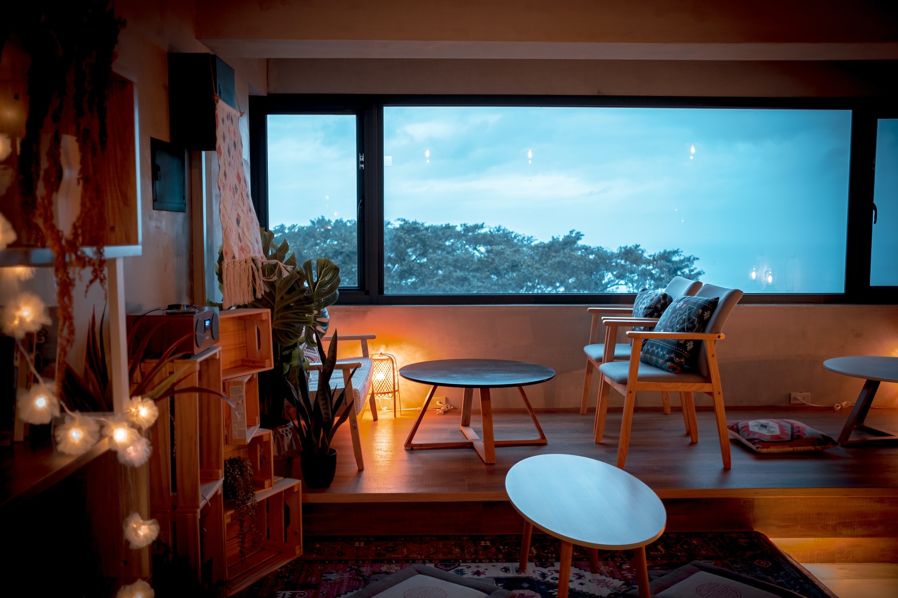 round brown wooden table with chairs